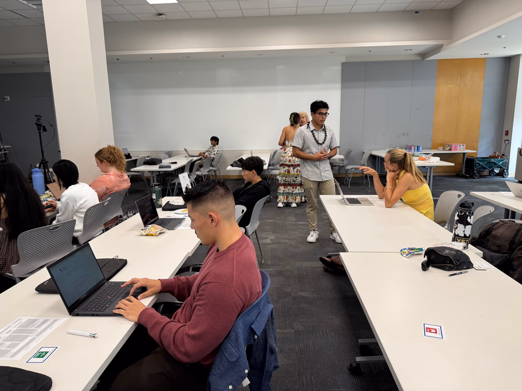Participants work at laptops during the student hackathon at Hawaii Pacific University.